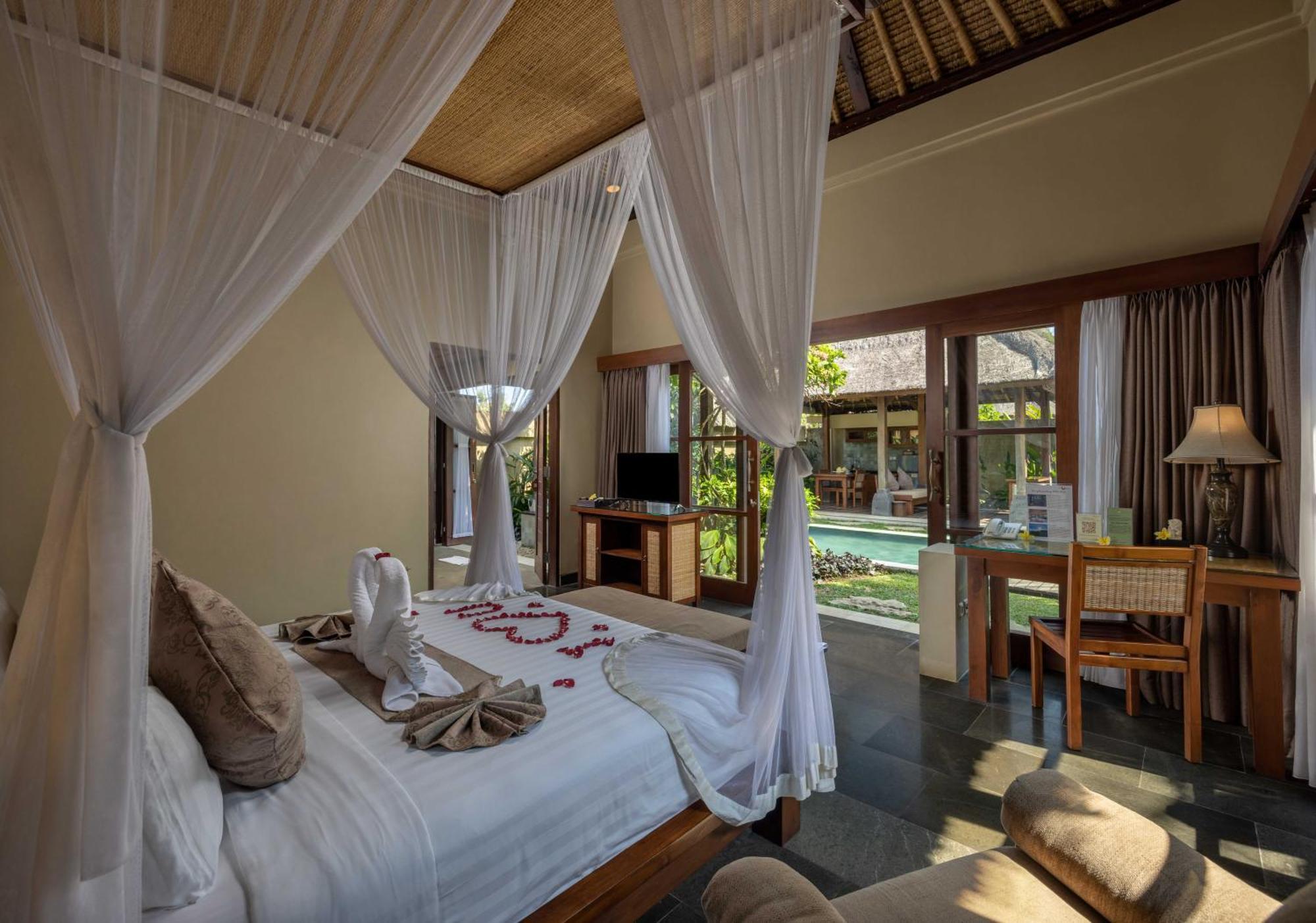 Ubud Nyuh Bali Resort & Spa Cameră foto A bedroom at the resort