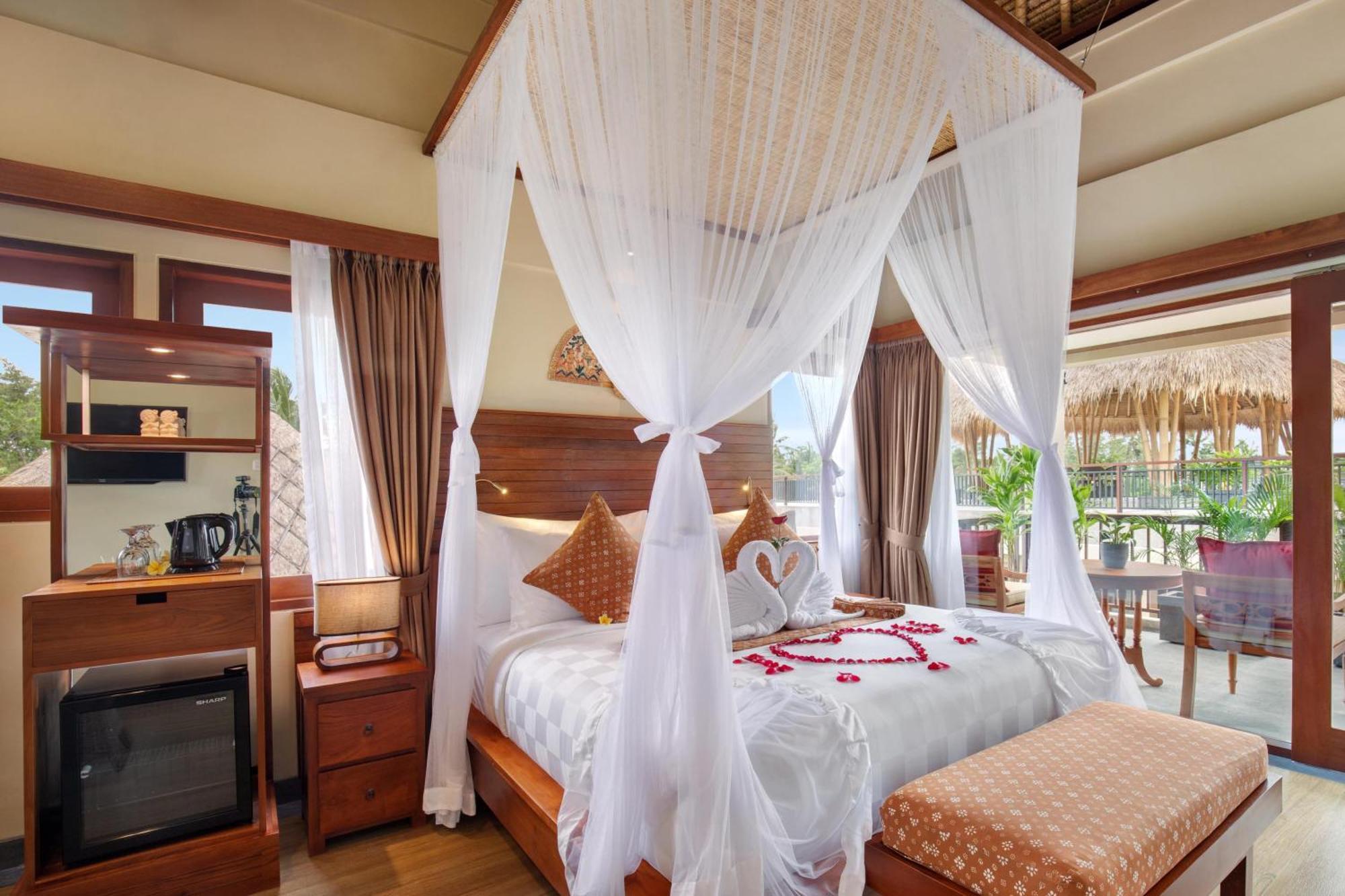 Ubud Nyuh Bali Resort & Spa Cameră foto A canopy bed