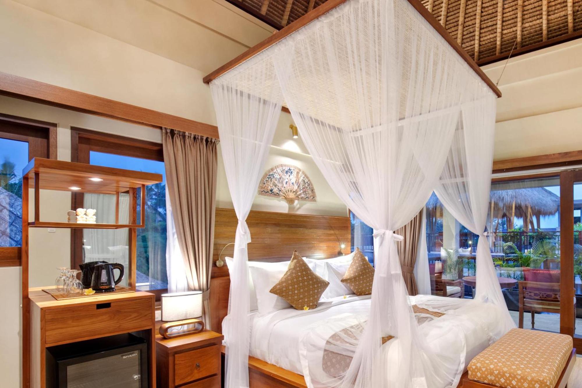 Ubud Nyuh Bali Resort & Spa Cameră foto A mosquito net over a bed